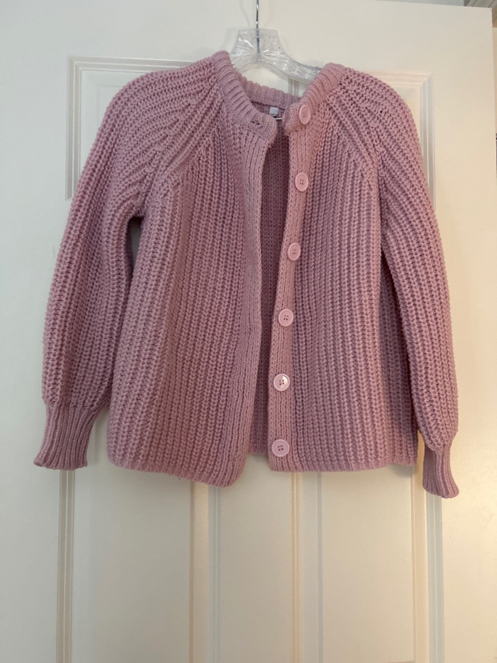 Women’s pink cable knit sweater